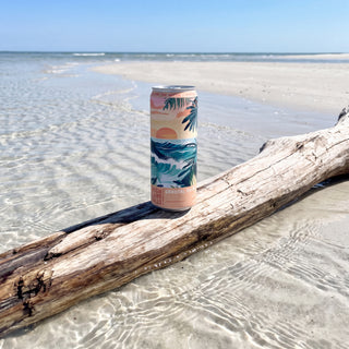 Coastal Calm can on a white sandbar